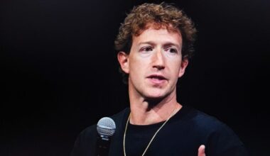 Mark Zuckerberg speaking to a microphone