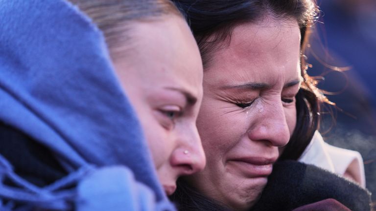 People were in tears during the memorial procession. Pic: AP