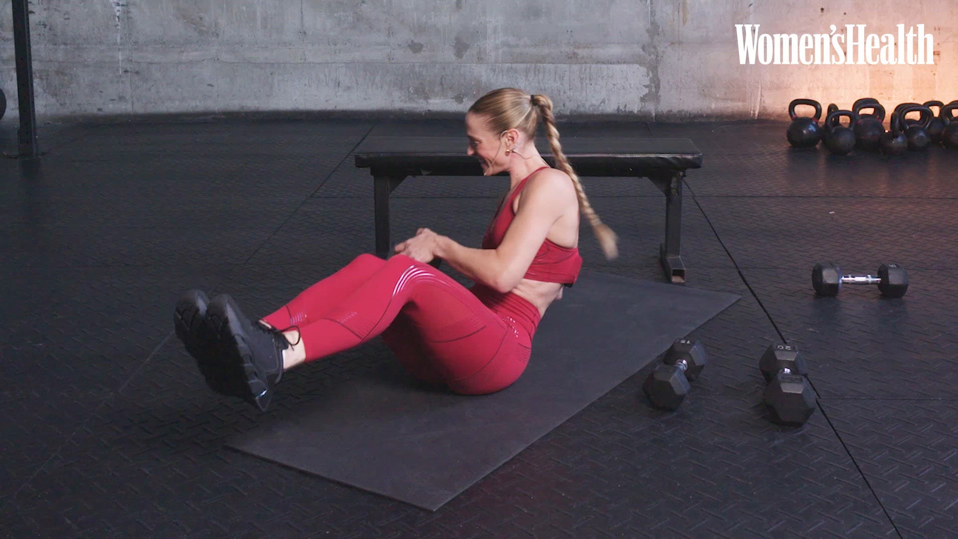 person performing a workout exercise with a dumbbell