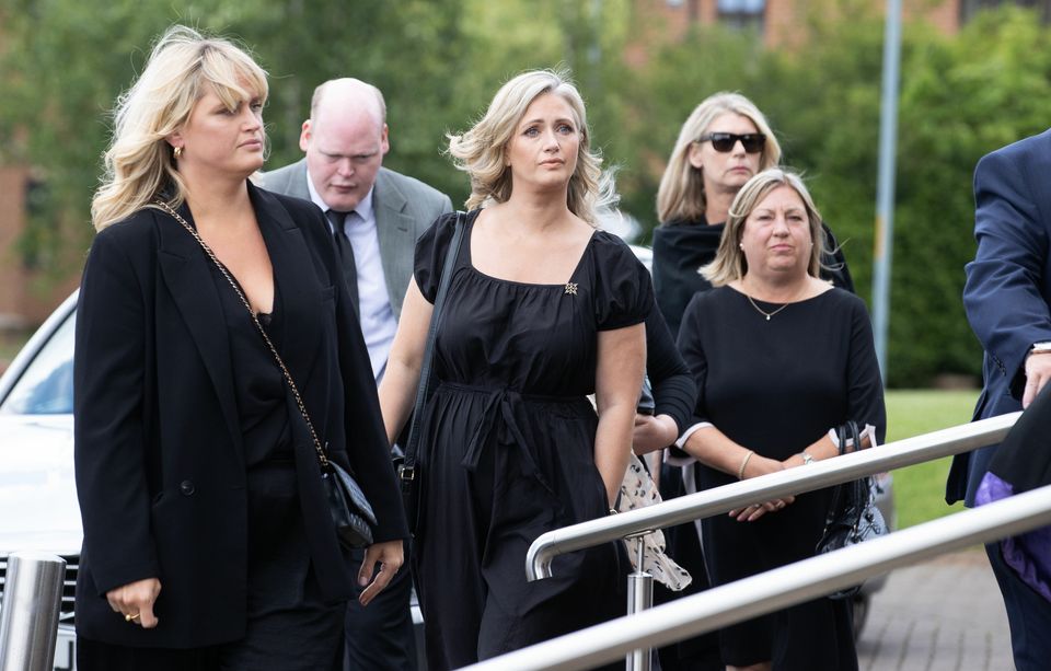 Hayley McQueen attending the funeral service of her father