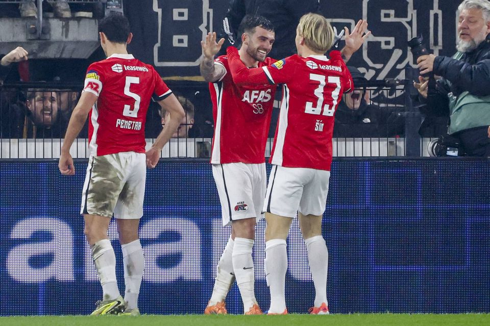 Troy Parrott celebrates with teammates after scoring his third, and AZ's fifth goal, during the Dutch Cup win over Ajax at AFAS Stadion