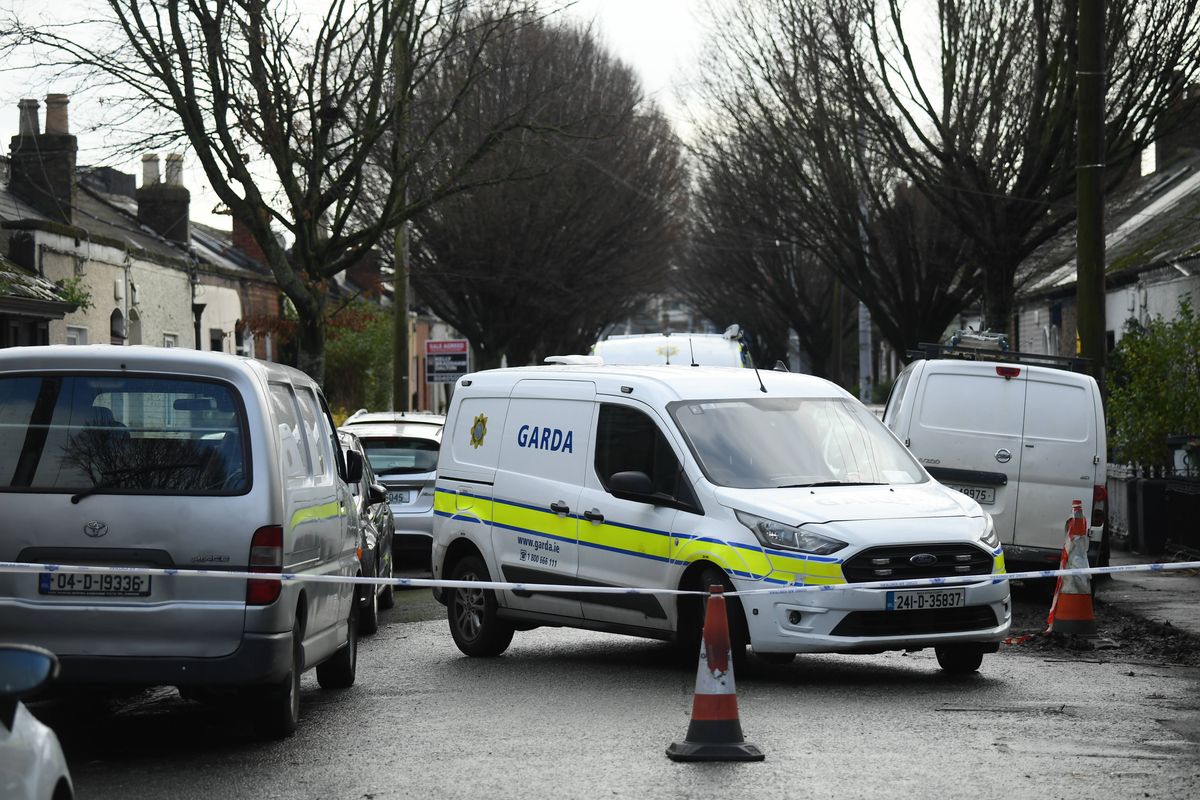 Gardai pictured at the scene after a man in his 50s died and two women were injured in a stabbing incident in north Dublin city