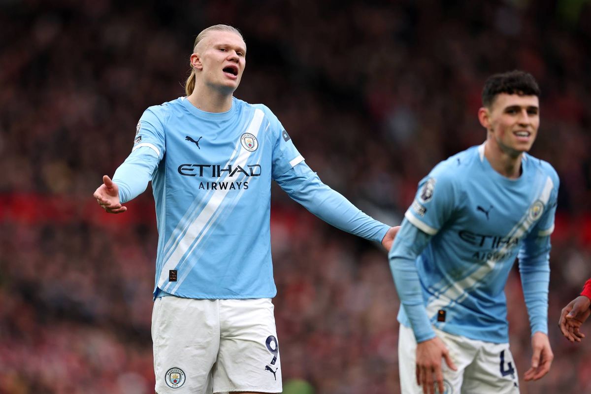 Erling Haaland looks dejected during the Premier League match between Manchester United and Manchester City at Old Trafford.
