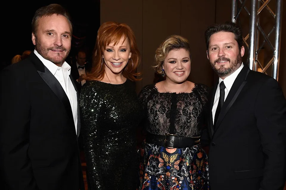 Narvel Blackstock, Reba McEntire, Kelly Clarkson, and Brandon Blackstock in 2015 Michael Buckner/Getty