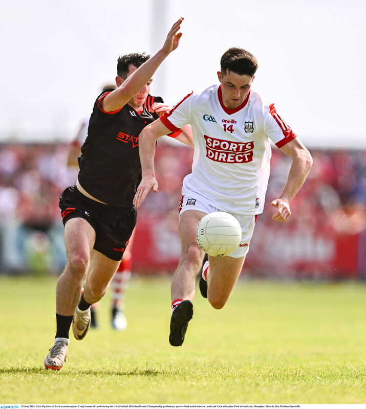 Chris Óg Jones of Cork in action against Craig Lennon of Louth during the GAA Football All-Ireland Senior Championship preliminary quarter-final match between Louth and Cork in 2024. Picture: Ben McShane/Sportsfile