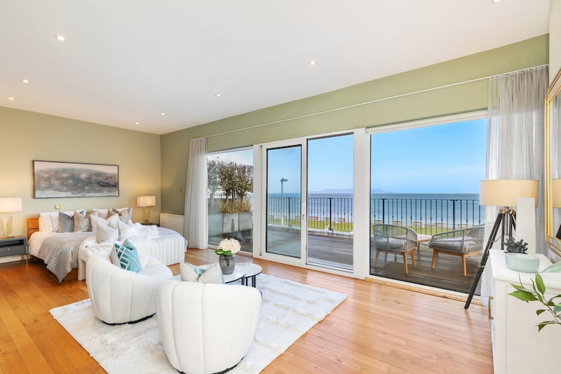 The main bedroom has a large balcony and great marine views