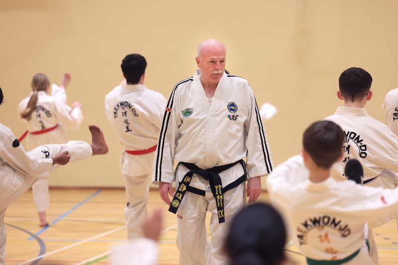 Gerry Martin warming up with students at Beaumont Taekwondo Centre. Photograph: Dara Mac Dónaill