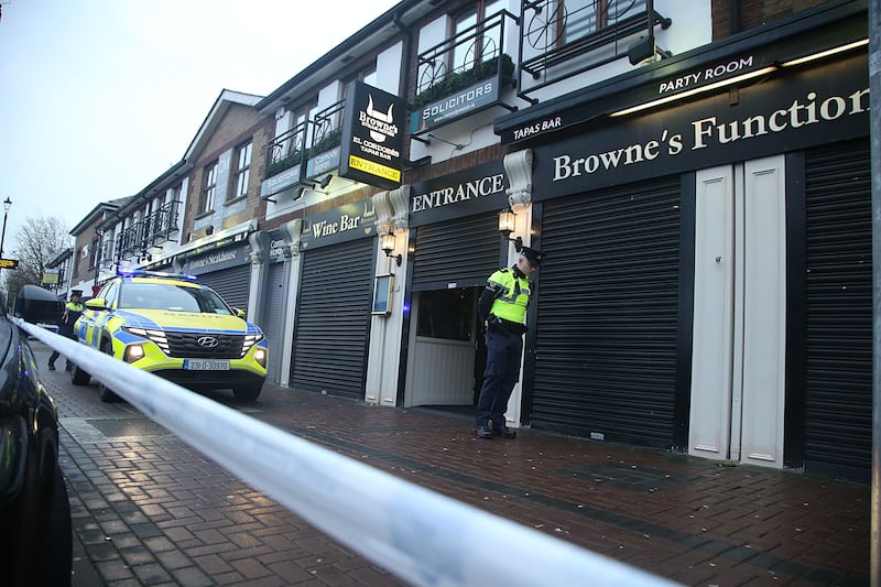 Gardaí outside Browne's Steakhouse in Blanchardstown where Tristan Sherry was fatally injured and Jason Hennessy snr was shot on Christmas Eve 2023. Hennessy later died from his injuries. Photograph: Stephen Collins/Collins