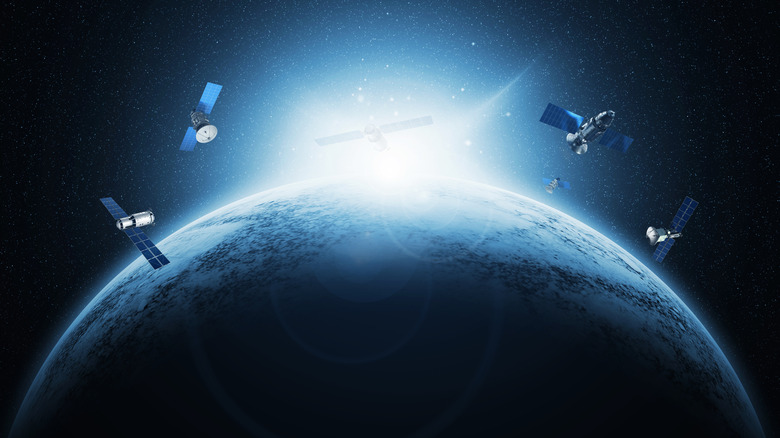Artist's rendering of satellites orbiting the Earth