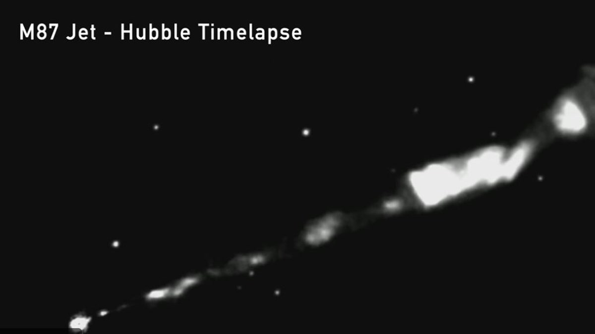 m87 black hole and jet stream image