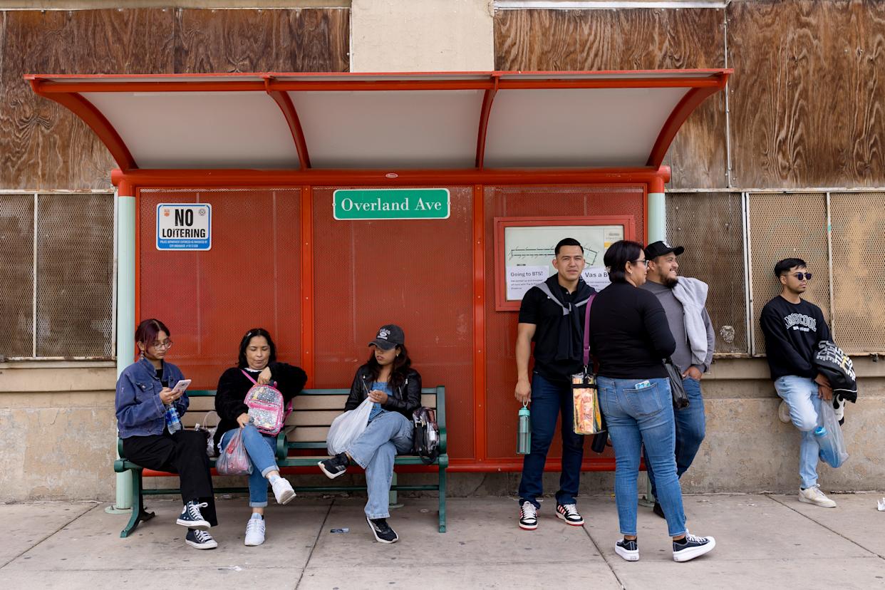Madeline Espinoza, 25, of Colorado, sits at far right while waiting for the streetcar in El Paso, Texas, on Saturday, May 2, 2026, before the first BTS concert.