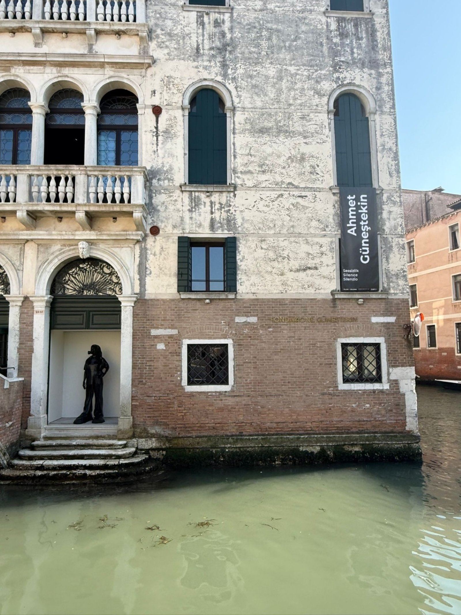 An exterior view of Ahmet Güneştekin’s “Silence” exhibition, with a view of a gondola and the canal, Venice, Italy, April 25, 2026. (Photo by Hasan Mert Kaya)