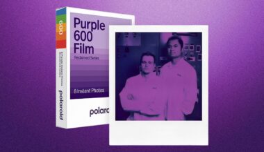 A Polaroid Purple 600 Film box stands next to a purple-tinted instant photo showing two people in lab coats posing against a purple gradient background.
