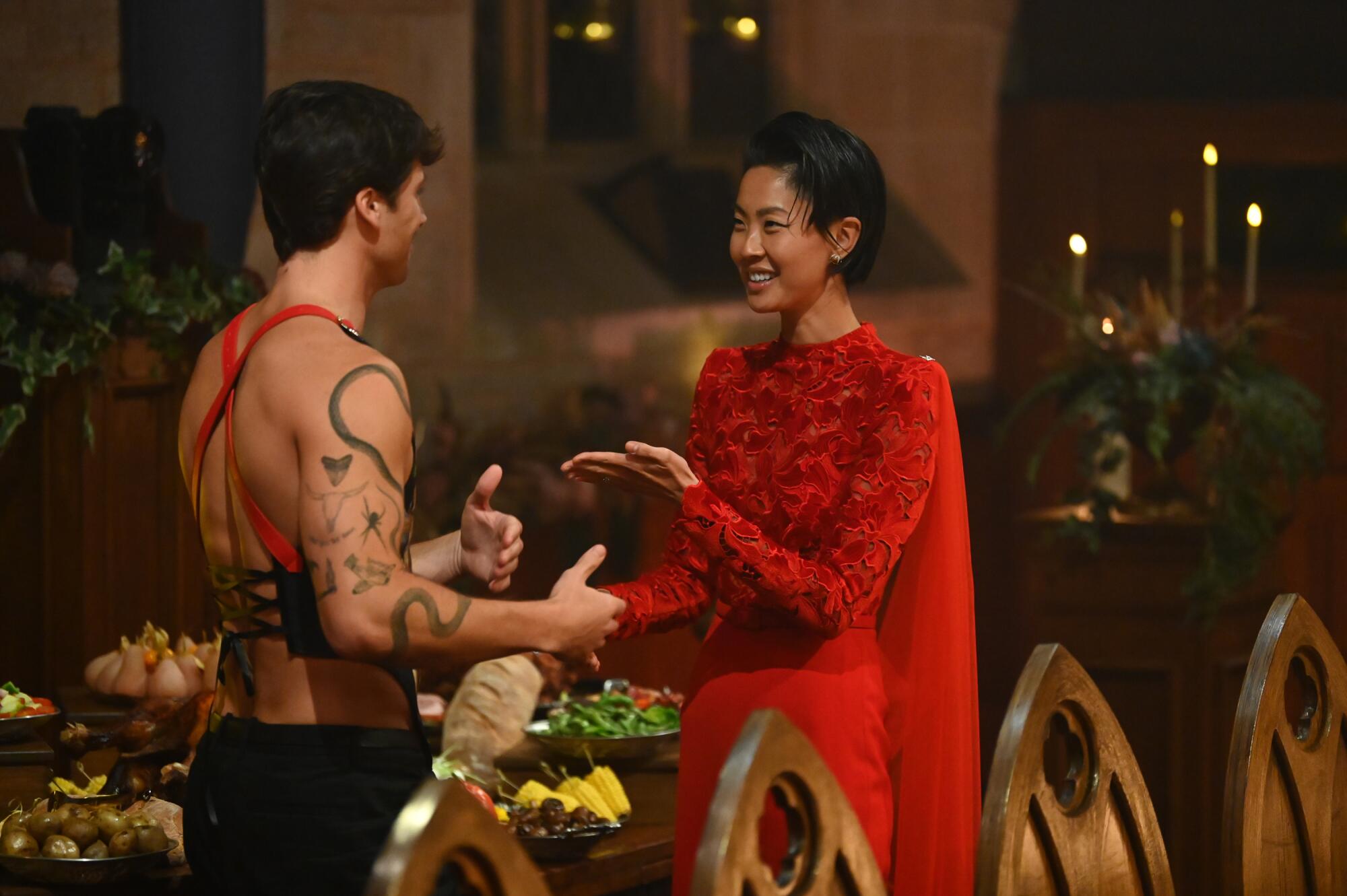 Rob Rausch and Kristen Kish on "The Traitors"