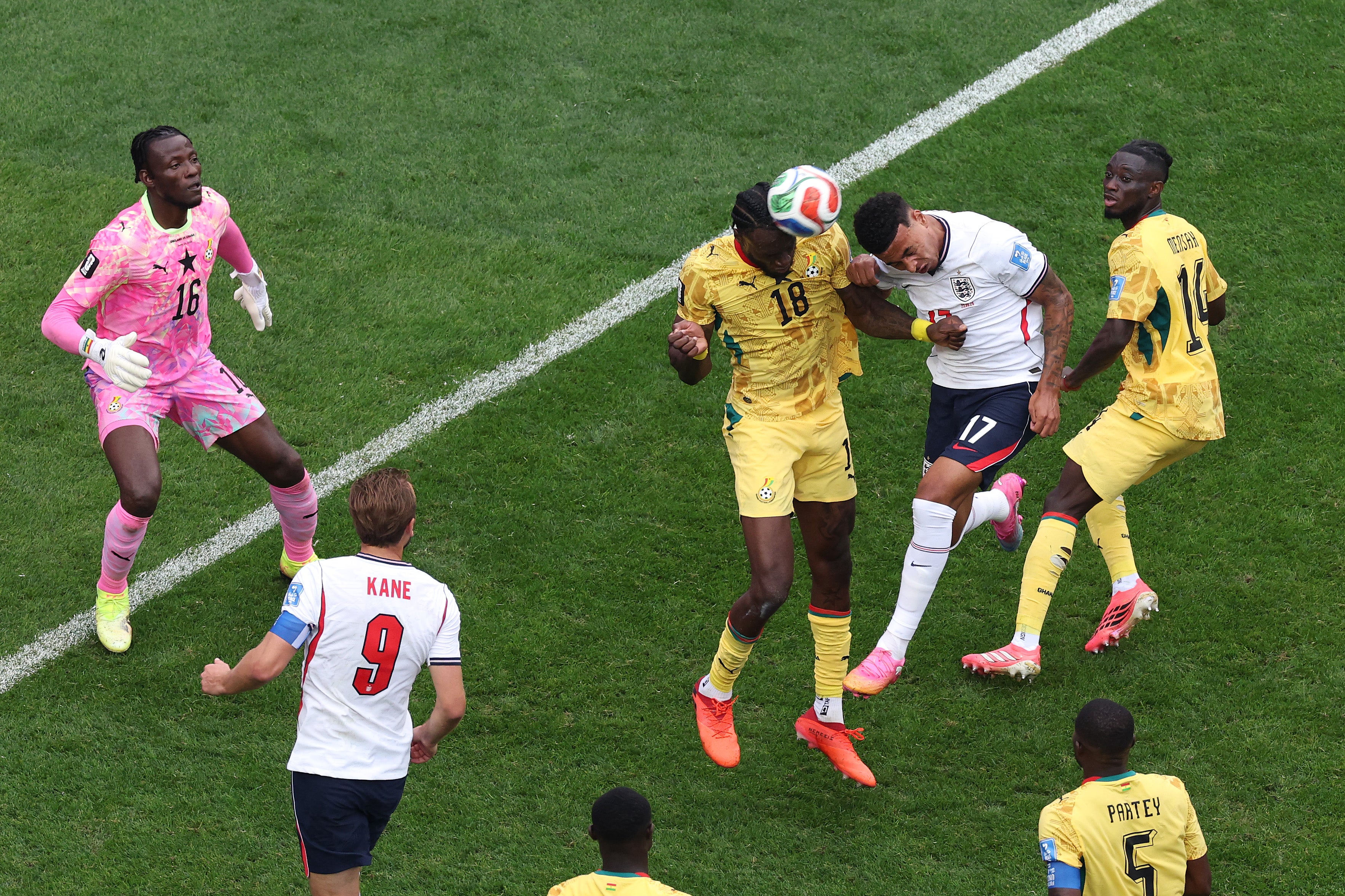 Morgan Rogers of England attempts a header against Jerome Opoku of Ghana