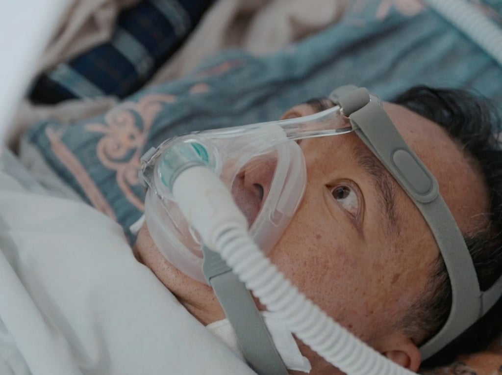 Cai Lei, above, pictured attached to medical equipment in a hospital bed. Photo: Yitiao