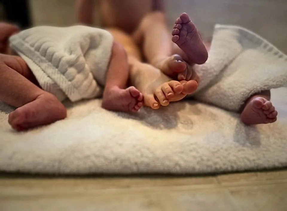 Amber Heard's newborn twins Ocean and Agnes' feet feature in a photo shared on Instagram