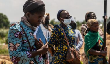 Mourners bury a 6-month-old Ebola victim in Congo