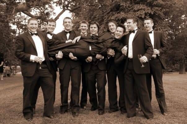 Orla Hopkins' husband Tommy and his groomsmen on the couple's wedding day. Picture: Lili Forberg.