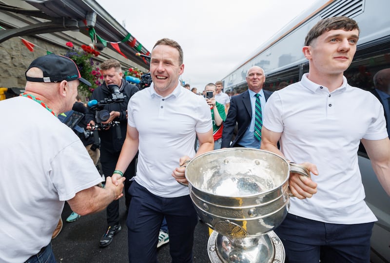 Mayo manager Andy Moran and captain Jack Coyne with the Sam Maguire Cup after arriving in Castlebar, Co Mayo, on Monday. Photograph: James Crombie/Inpho