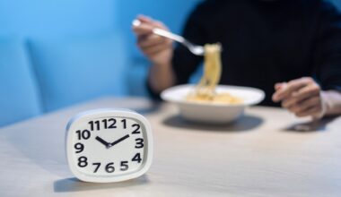 Man eating late night time alone at home or apartment scene.