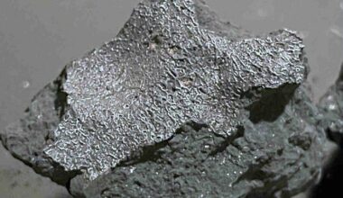 Fragment of the Hillsborough meteorite, broken on impact, with fusion crust from passing at high speed through the Earth’s atmosphere. Credit SETI Institute