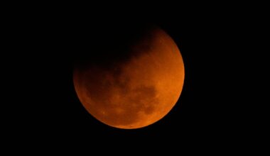 The "blood moon" is seen shortly after a total lunar eclipse from Guwahati, India, on March 3, 2026.
