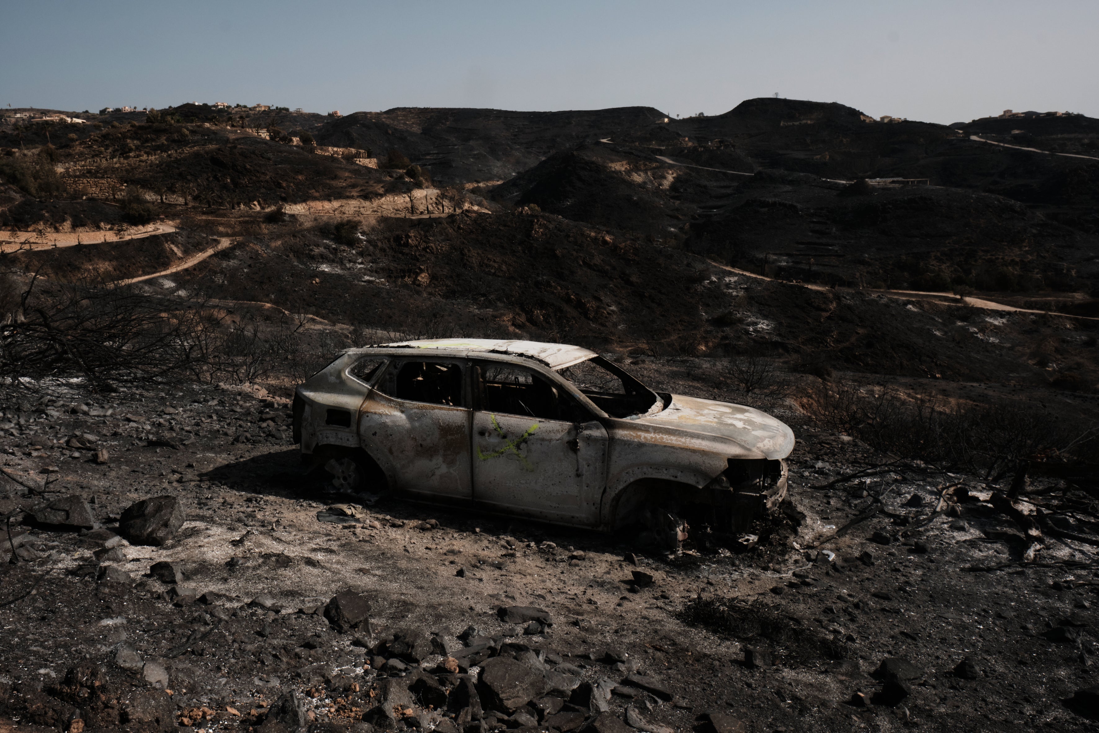 Seven people died after leaving their cars and attempting to escape the fires on foot