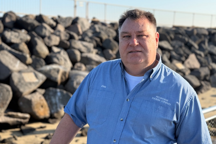 Tourism operator John Stapleton stands near the St Kilda pier.