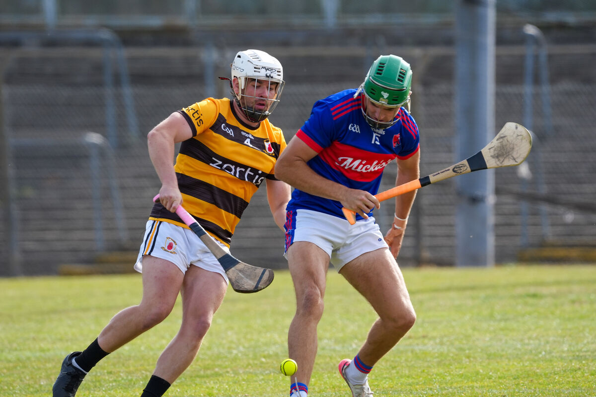 Na Piarsaigh’s Aaron Higgins and Erins Own’s Conor Lenihan battle for possession. Picture: Noel Sweeney