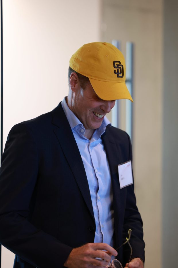 Ger Bythell, San Diego's Arup office leader, wore a padres cap during the ribbon cutting ceremony. (San Diego Regional EDC)