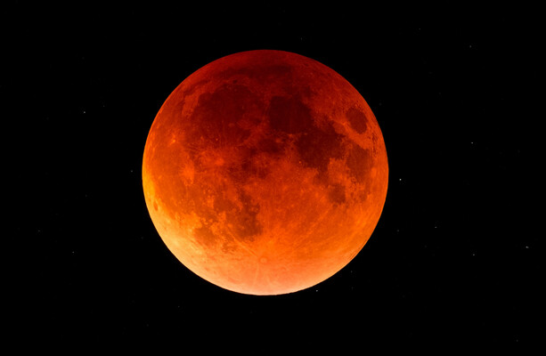 There's a rare partial 'blood moon' eclipse early Friday morning