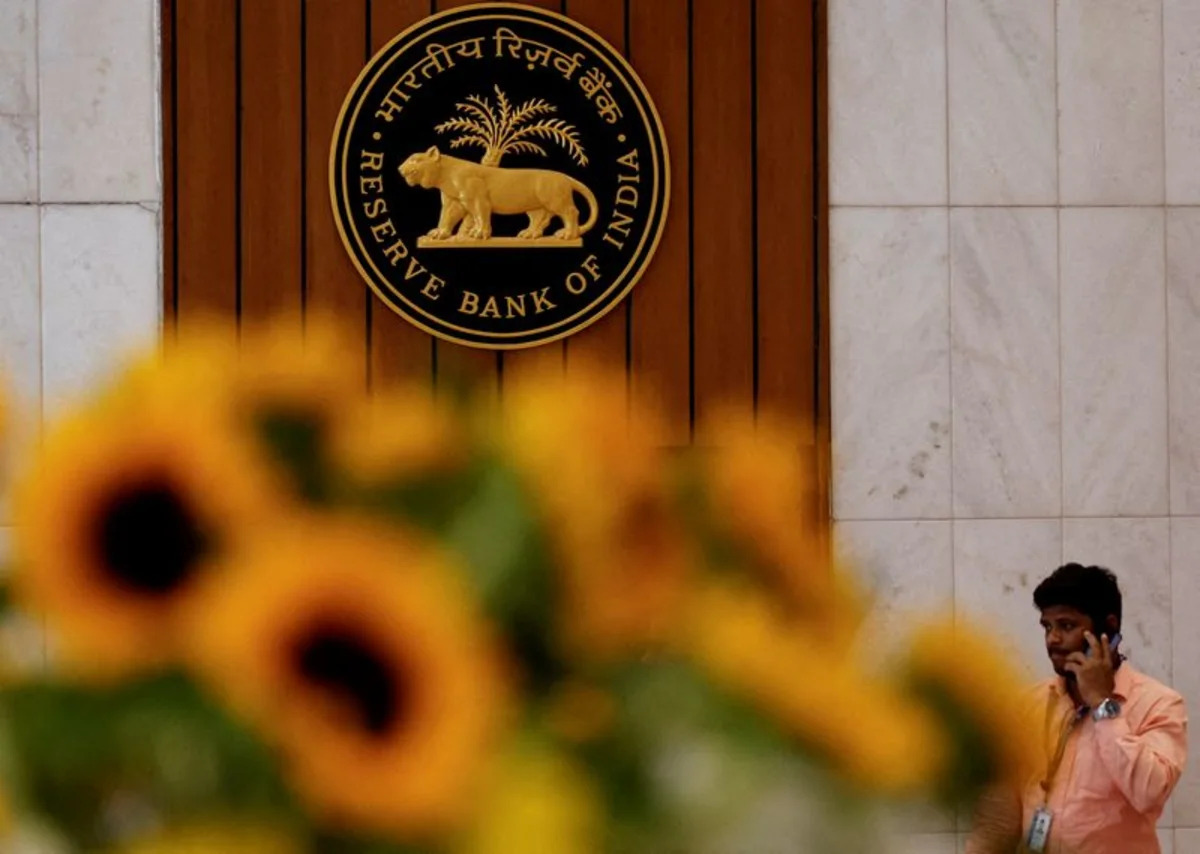 India's central bank holds rates, awaits clearer inflation signal before acting