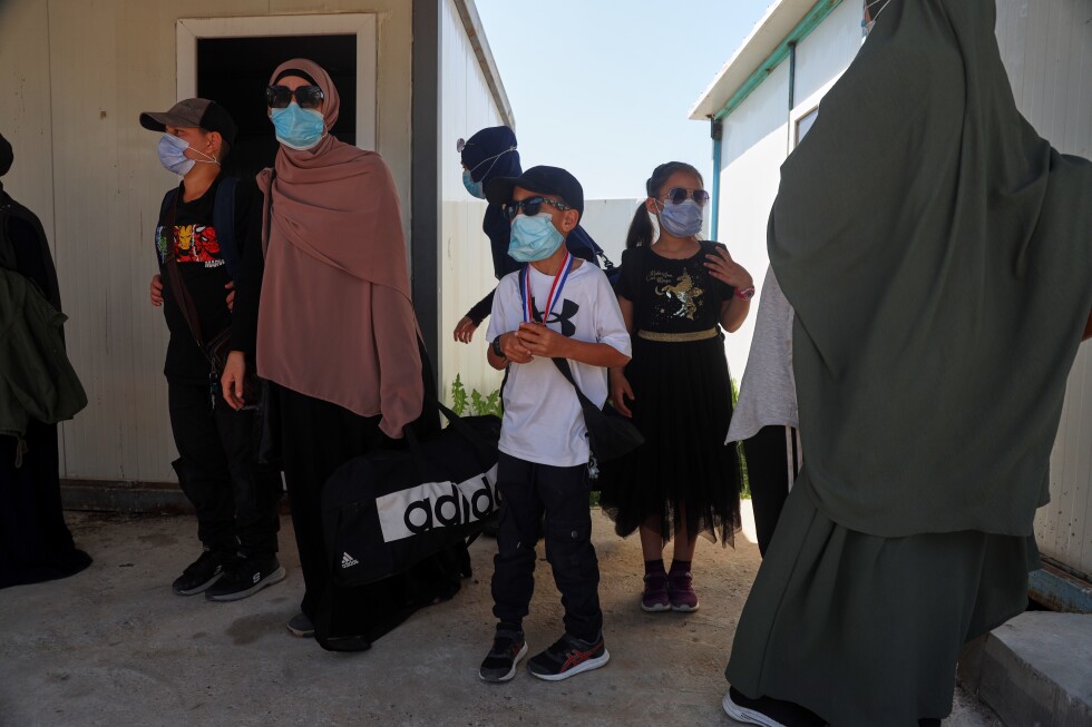 Australian families leave Syria camp linked to Islamic State militants