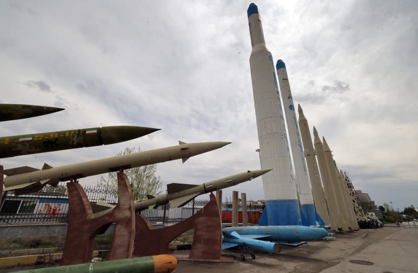 Mockups of domestically-made Iranian missiles are displayed at an exhibition outside the Defence Museum in Tehran on March 31, 2026.