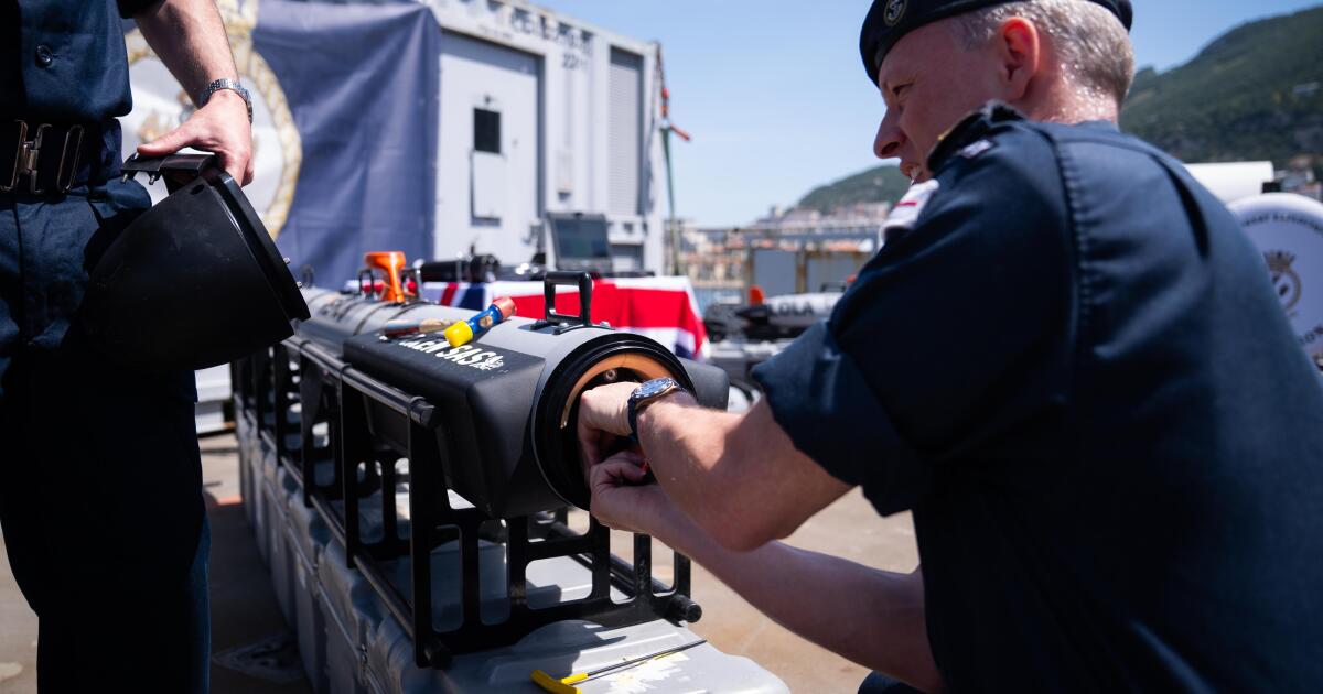 Britain's navy prepares to clear mines in the Strait of Hormuz while waiting for a peace deal