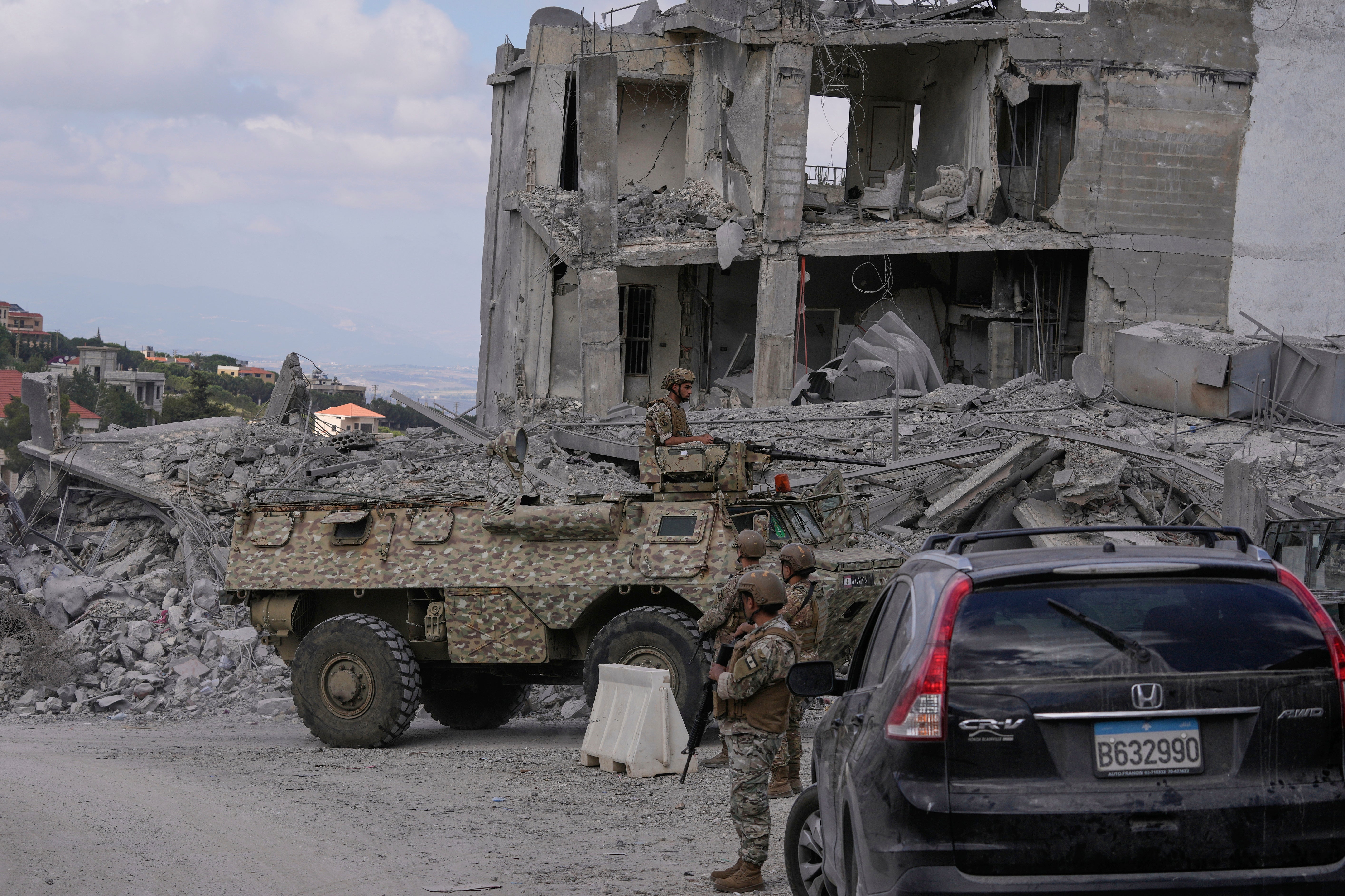 Lebanese soldiers are deployed in the village of Beer al-Salassel, south Lebanon, after people start to return to their villages, on 15 June