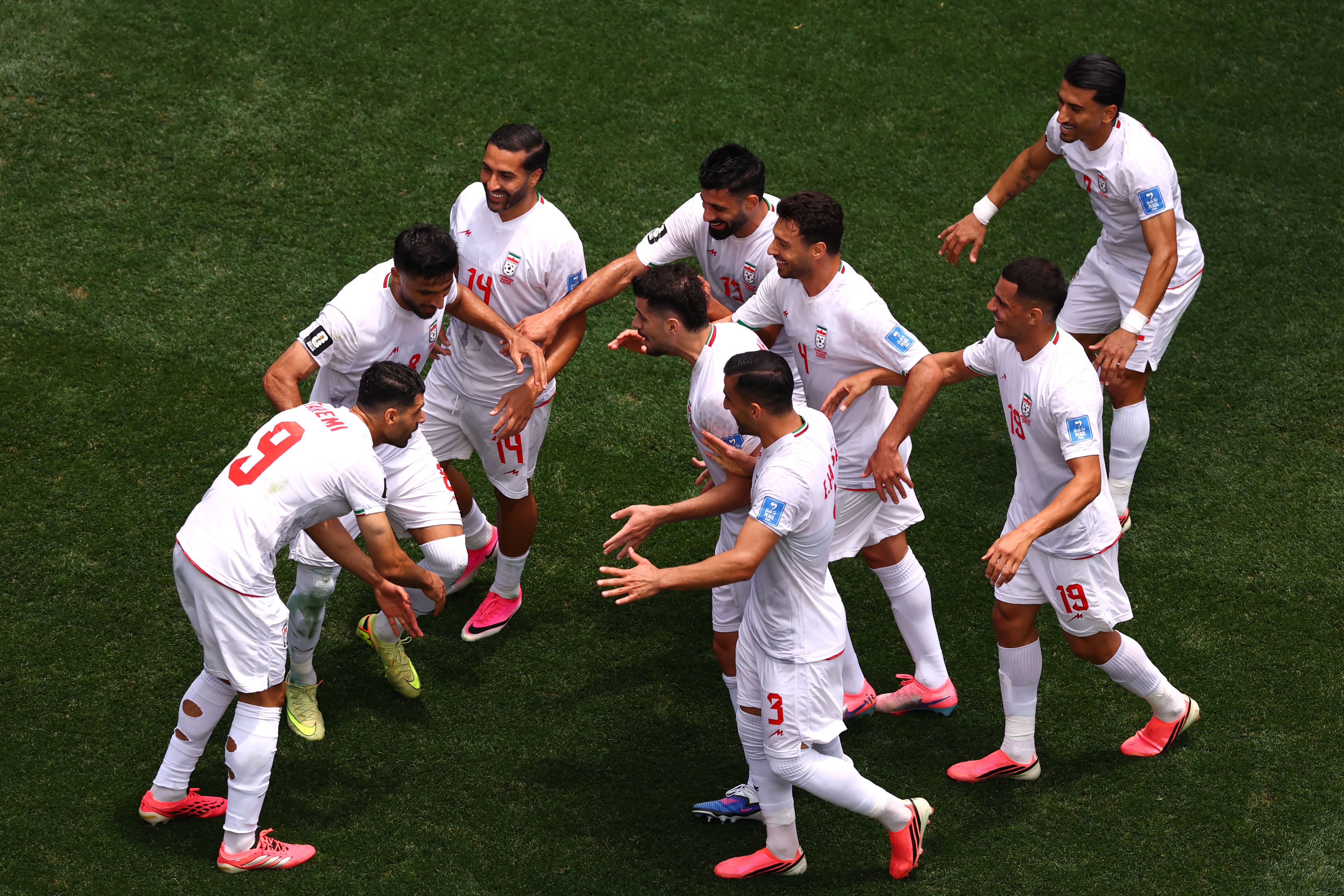 Mehdi Taremi #9 of Iran celebrates scoring a goal with teammates before it was disallowed due to offside during the FIFA World Cup 2026 Group G match between Belgium and IR Iran at Los Angeles Stadium on June 21