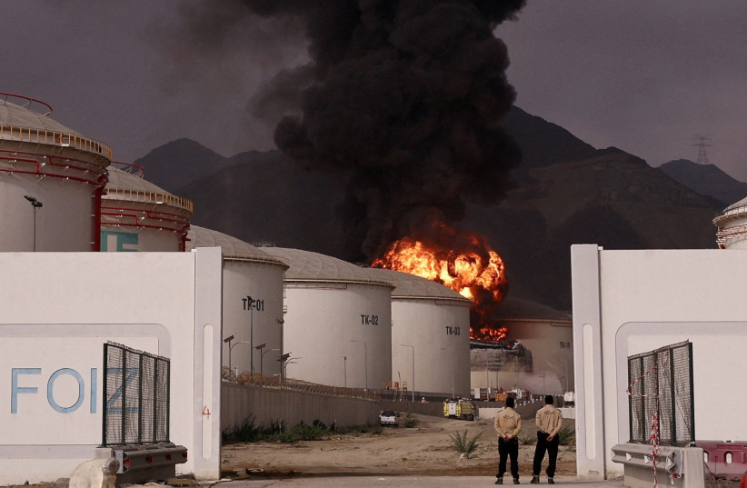Fire and smoke rise in the Fujairah Oil Industry Zone, caused by debris after interception of a drone by air defenses, UAE, March 4, 2026; illustrative.