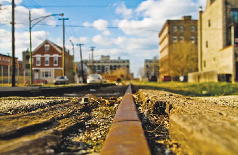 Railroad Track in downtown Chicago: Growing up on the South Side, Sinise ‘ran a little wild.’
