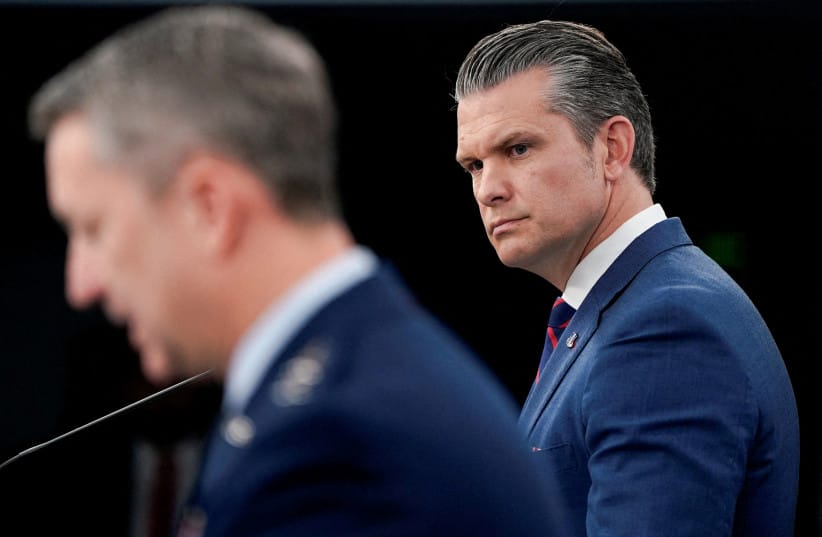 US Secretary of Defense Pete Hegseth and Chairman of the Joint Chiefs of Staff General Dan Caine hold a briefing amid the US-Israeli conflict with Iran, at the Pentagon in Washington.