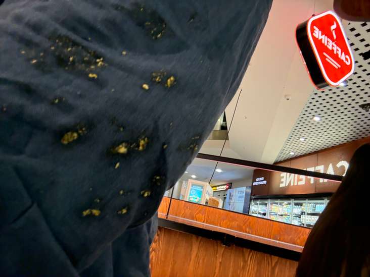 Jacob's shirt covered in pizza after the alleged assault (Courtesy)