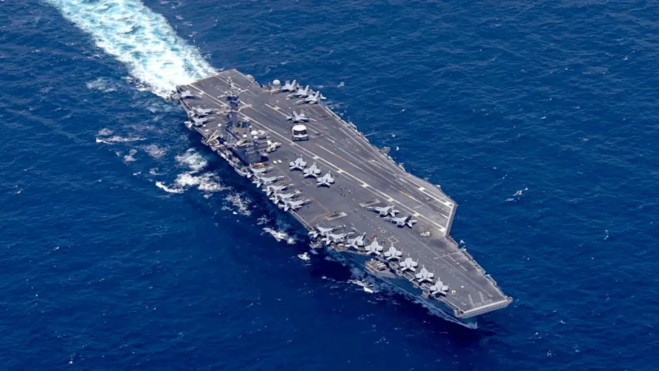 USS George H.W. Bush aircraft carrier transiting Arabian Sea