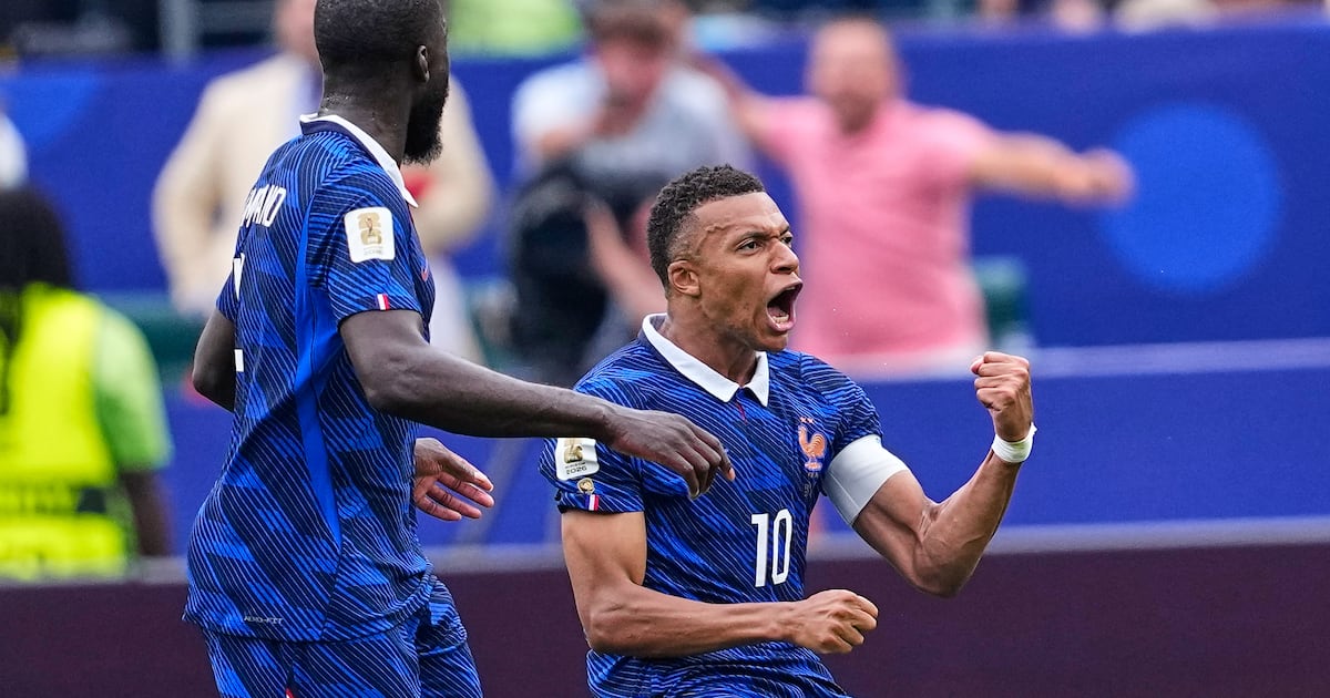 Mbappé scores twice to lead France past Iraq and into World Cup knockout stage