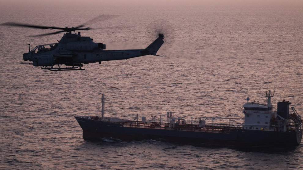 A US Marine Corps attack helicopter patrols near Iran.