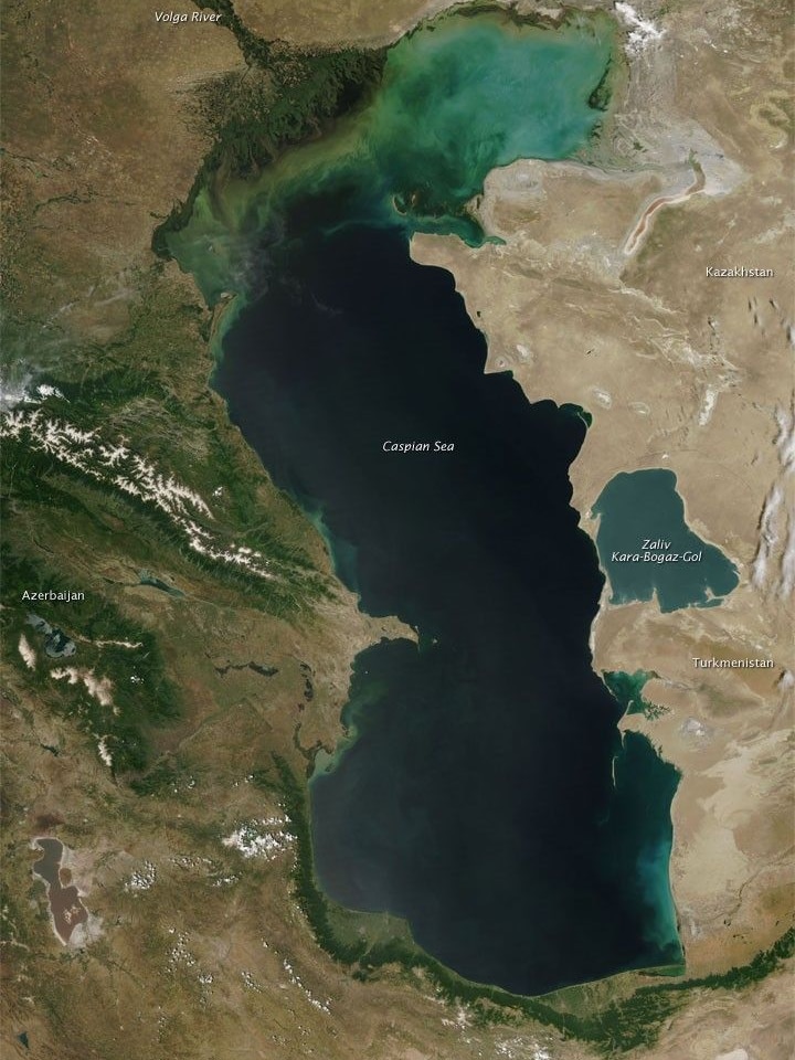 A satellite view of a body of water surrounded by land.