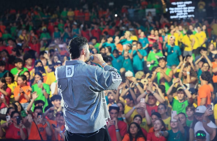 Israeli singer Noam Bettan performs at the RootOne Big Tent event in Rishon Lezion. July 12, 2026.