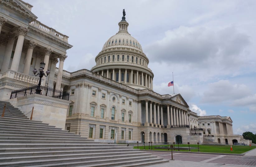 A flag flies at half-staff at the U.S. Capitol building following the death of Senator Lindsey Graham (R-SC) on July 12, 2026 in Washington, DC.