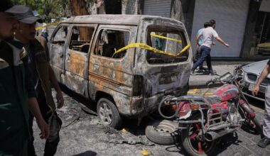 Explosions rock Syria's capital as French President Macron visits