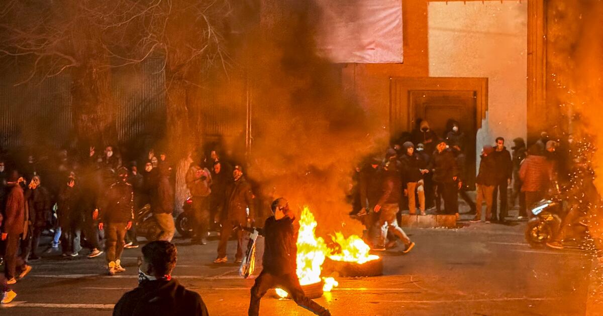 Iran publicly executes 2 men accused of killing police during protests